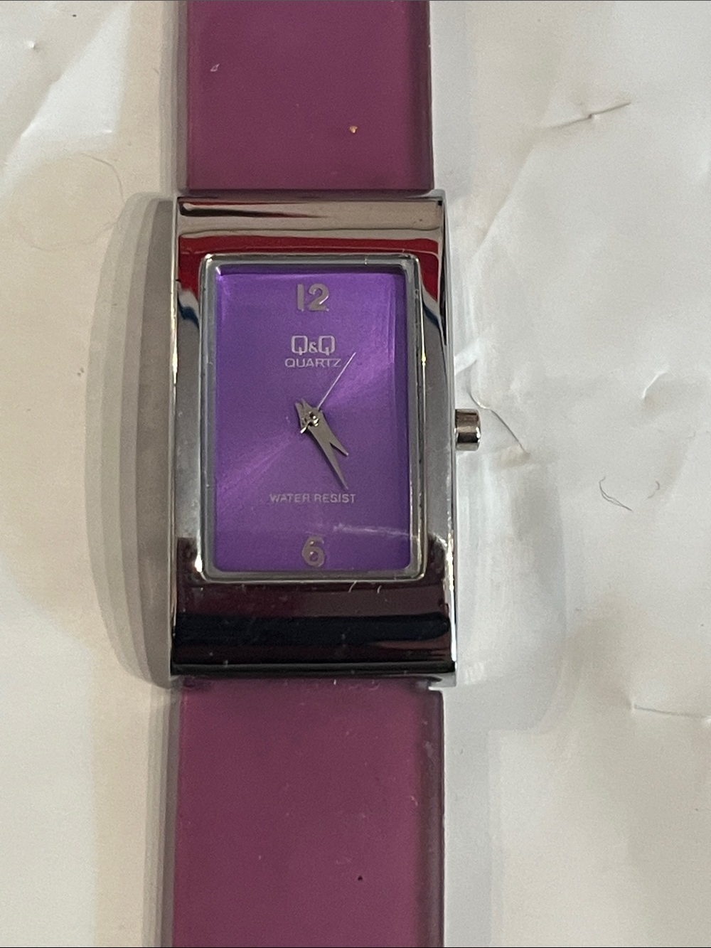 G& G watch with purple rubber band, good cond
